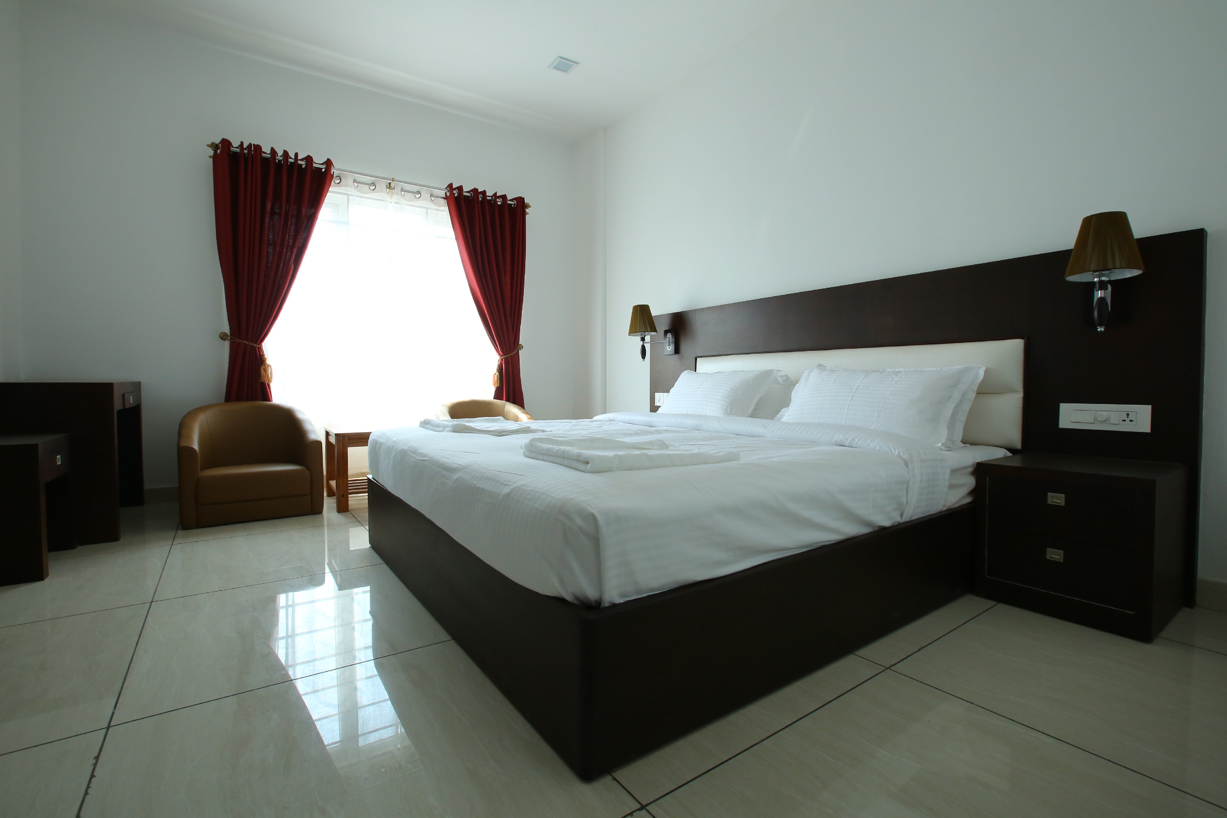 Hotel Theertha International - Tap to explore photos