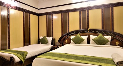 Navanidhi Comforts Room Type - Deluxe Triple Ac Room