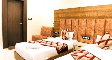 HOTEL ORCHID INN Room Type - Deluxe Room (Twin Bed)