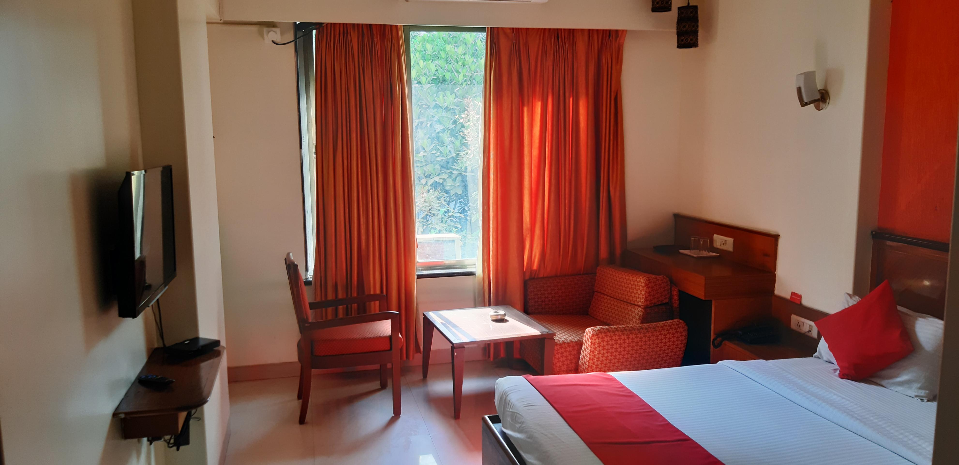 HOTEL DHIRAJ - Tap to explore photos