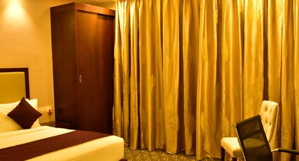 White Feather Room Type - Deluxe Room AC with Balcony