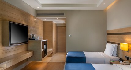 Holiday Inn Agra MG Road Room Type - 2 Single Beds Standard-15pct discount on F&B(including in room dining),laundry,ironing Holiday Inn Agra MG Road Room Type - 2 Single Beds Standard-15pct discount on F&B(including in room dining),laundry,ironing