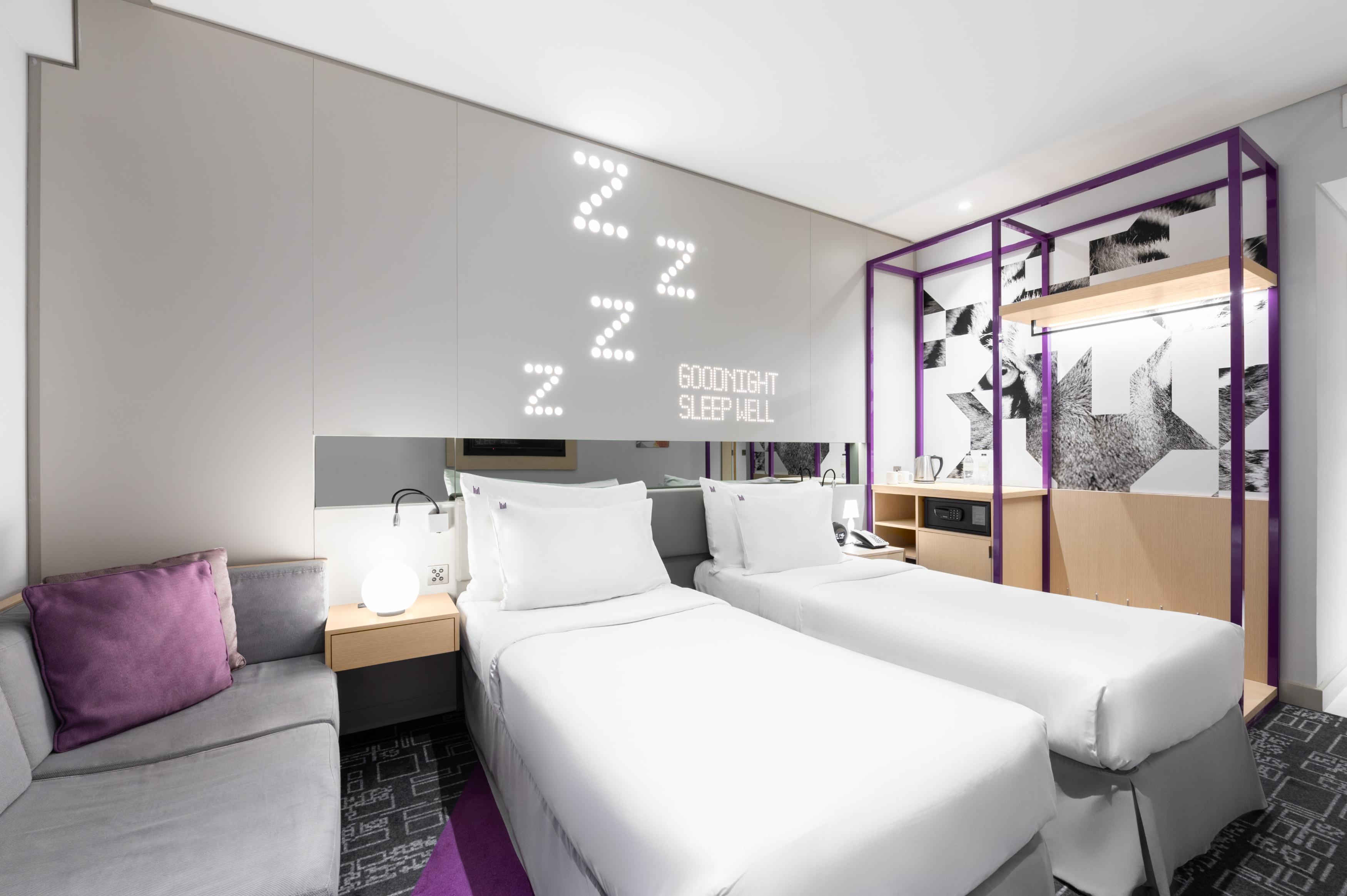 Studio M Arabian Plaza Hotel & Hotel Apartments Room Type - Urban Twin Room - Pool View with Complimentary Shuttle Service