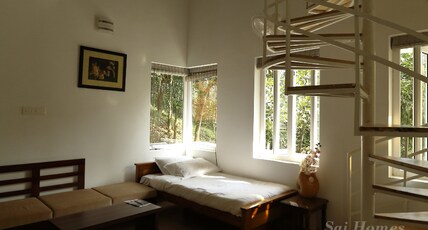 Sai Holiday Home | with tea-garden view Room Type - Suite Room with balcony (Tea-Garden view)