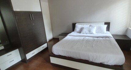 Sai Holiday Home | with tea-garden view Room Type - Family Room (Ground Floor)