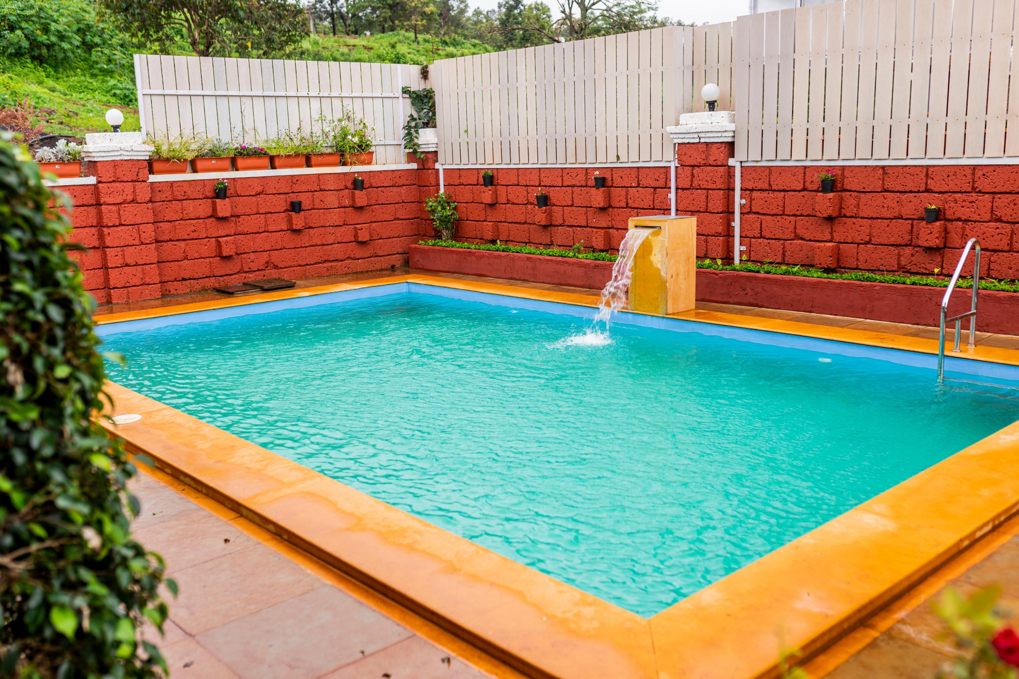 Shree Samarth Villaa | Pool & Lawn - Tap to explore photos