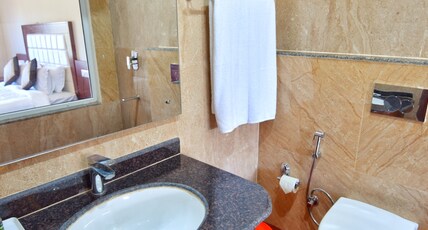 The Grand Kartikeye Hotel Room Type - Deluxe Non AC Room With Balcony The Grand Kartikeye Hotel Room Type - Deluxe Non AC Room With Balcony