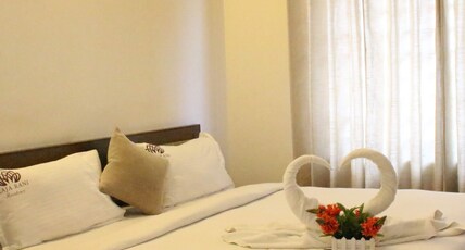 RAJA RANI RESIDENCY Room Type - Deluxe Double Room RAJA RANI RESIDENCY Room Type - Deluxe Double Room