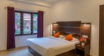 Hotel Mountain Hues Thekkady Room Type - Deluxe Room With King Bed Hotel Mountain Hues Thekkady Room Type - Deluxe Room With King Bed