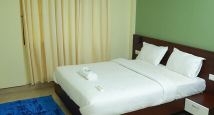 Hotel Brahmaputhra   Room Type - Four Bed AC Family Room