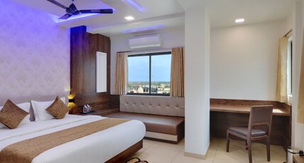 Hotel Devkinandan Room Type - 3 Bedded AC Family Room with Temple or Sea view (Price is for 3 Adults) Hotel Devkinandan Room Type - 3 Bedded AC Family Room with Temple or Sea view (Price is for 3 Adults)