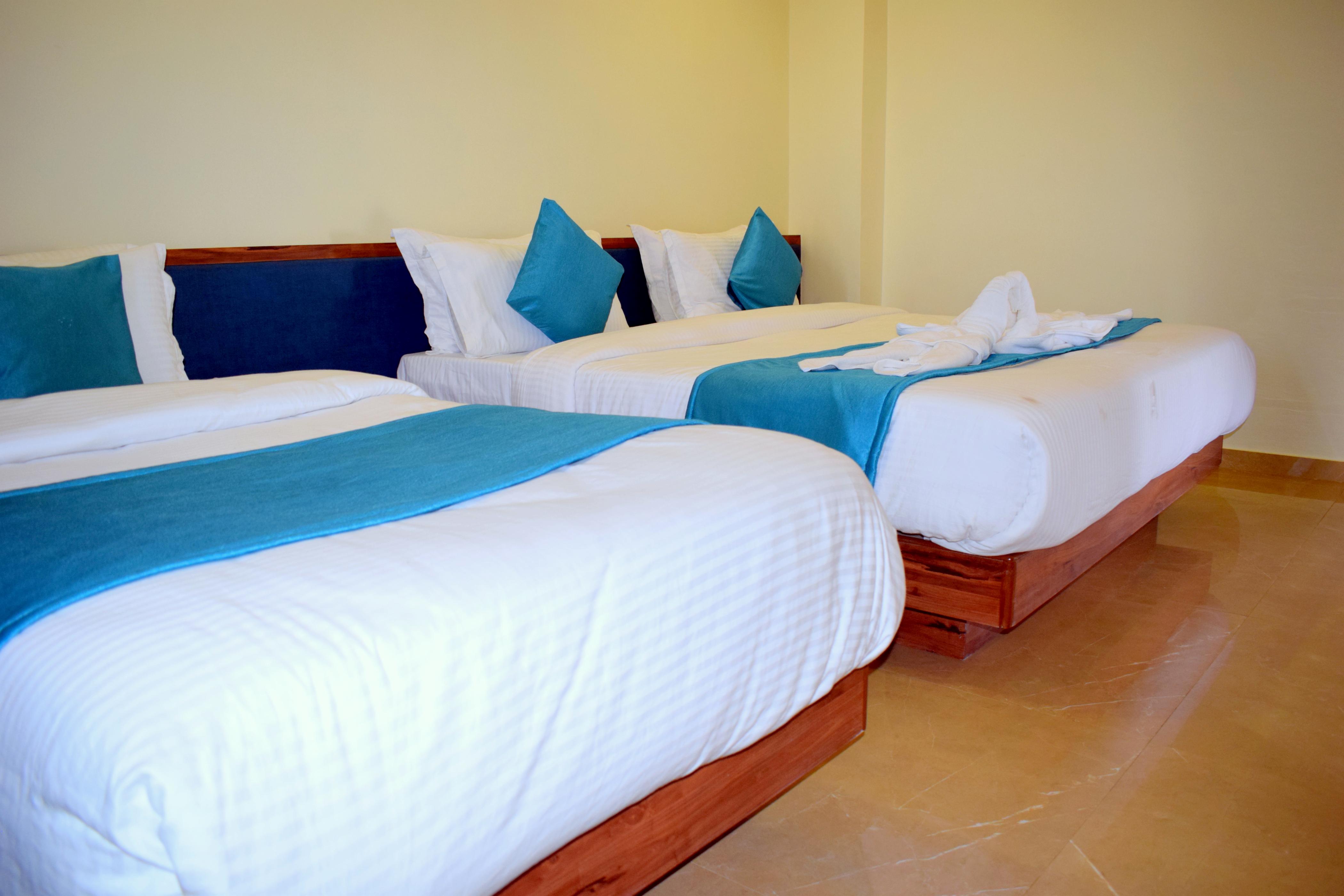 Hotel Kuber - Tap to explore photos