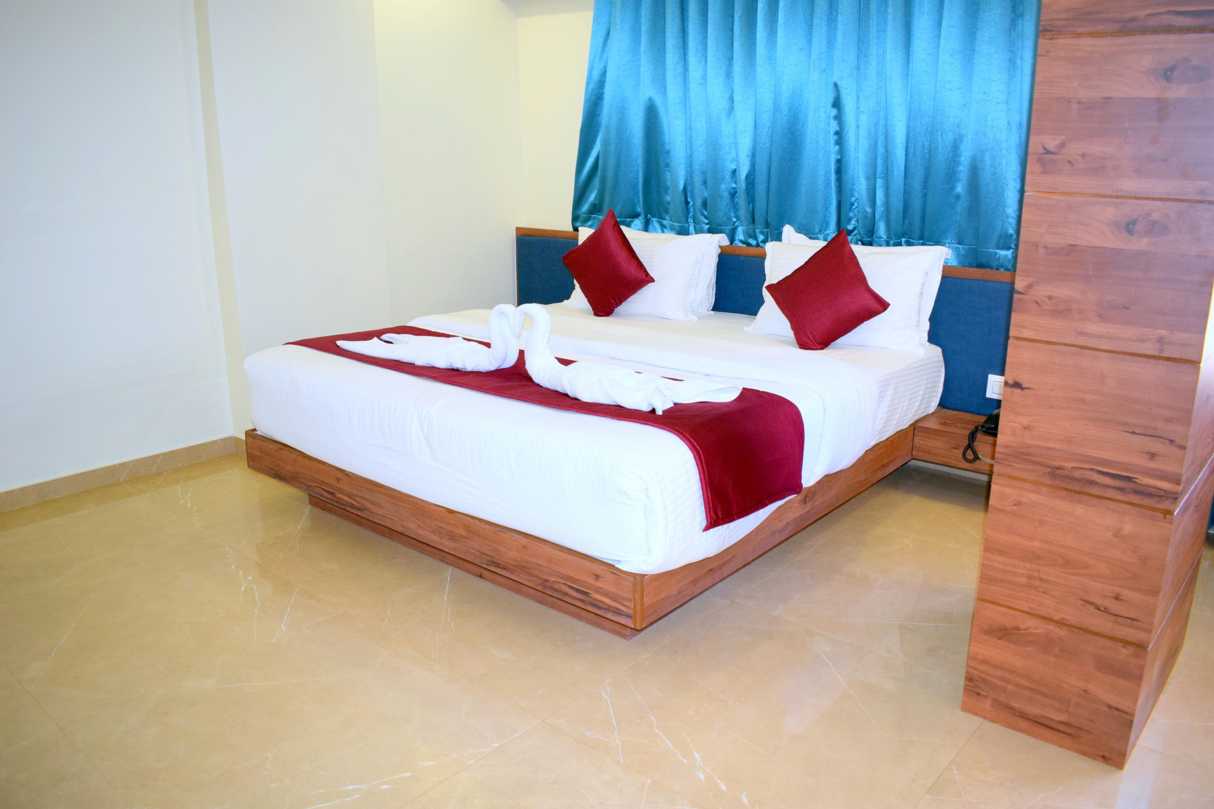 Hotel Kuber - Tap to explore photos