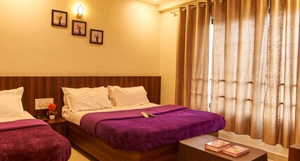 HOTEL DISHA PALACE Room Type - Deluxe Triple Bed AC