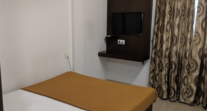 Aashraya Hotel Room Type - Deluxe AC Room