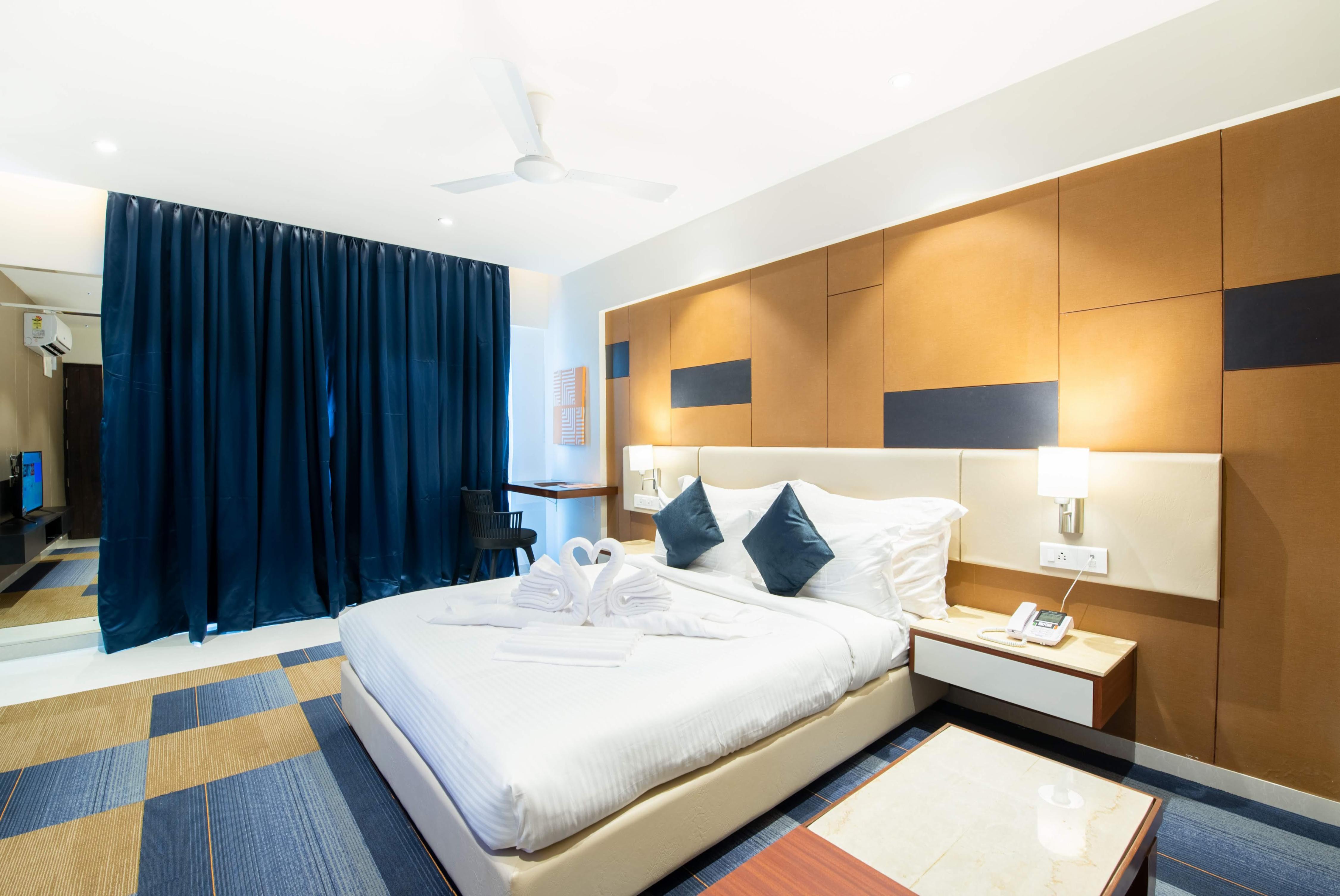 StayBird - B Suite, A Business Hotel - Tap to explore photos