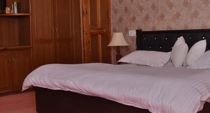 Elysium castle shimla Room Type - Deluxe Double-sharing Room