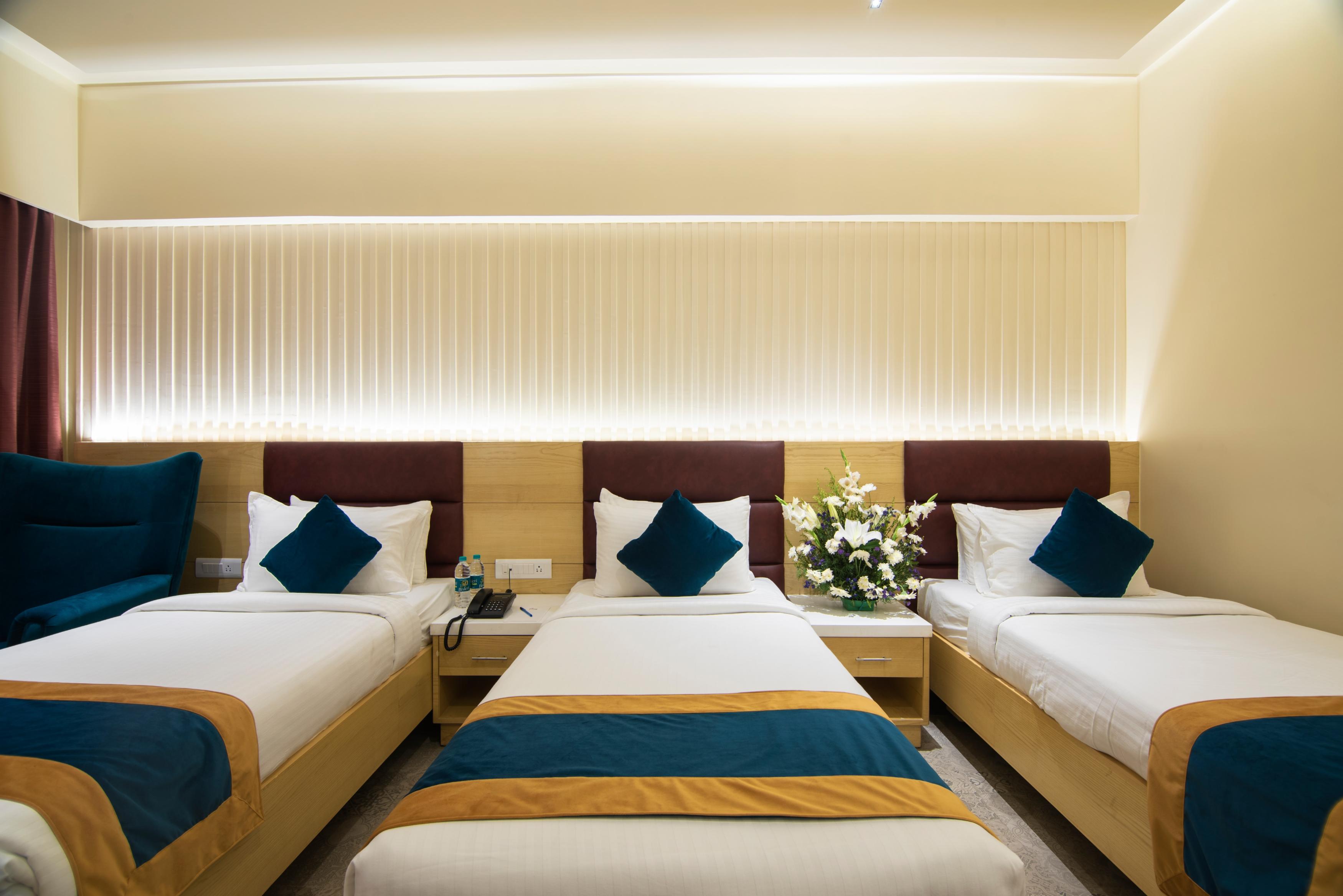 ZION-a Luxurious hotel Room Type - Deluxe Room Triple Bed
