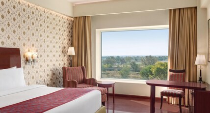 Ramada by Wyndham Jaipur Jaisinghpura Room Type - 1 King Bed, Deluxe Room, Non-Smoking Ramada by Wyndham Jaipur Jaisinghpura Room Type - 1 King Bed, Deluxe Room, Non-Smoking