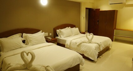 Nitheesh Residency Room Type - Family 4 BED AC Room