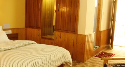 HOTEL GAWA RETREAT Room Type - Deluxe room with balcony.