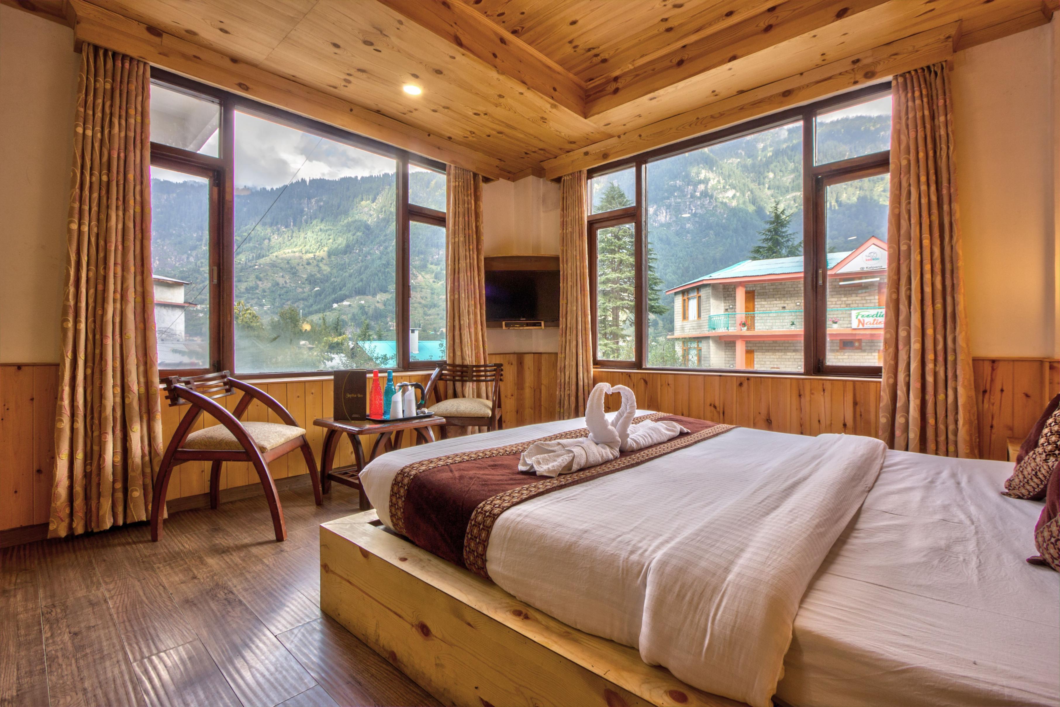 Hotel Japika inn by Hazel Hotels (2 mins Walking to Hadimba Temple) Room Type - Deluxe Room (With Mountain view and Private Balcony) Hotel Japika inn by Hazel Hotels (2 mins Walking to Hadimba Temple) Room Type - Deluxe Room (With Mountain view and Private Balcony)
