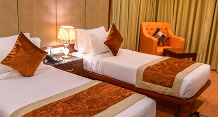 Hotel Indo Prime- City Centre Room Type - Deluxe Twin room.