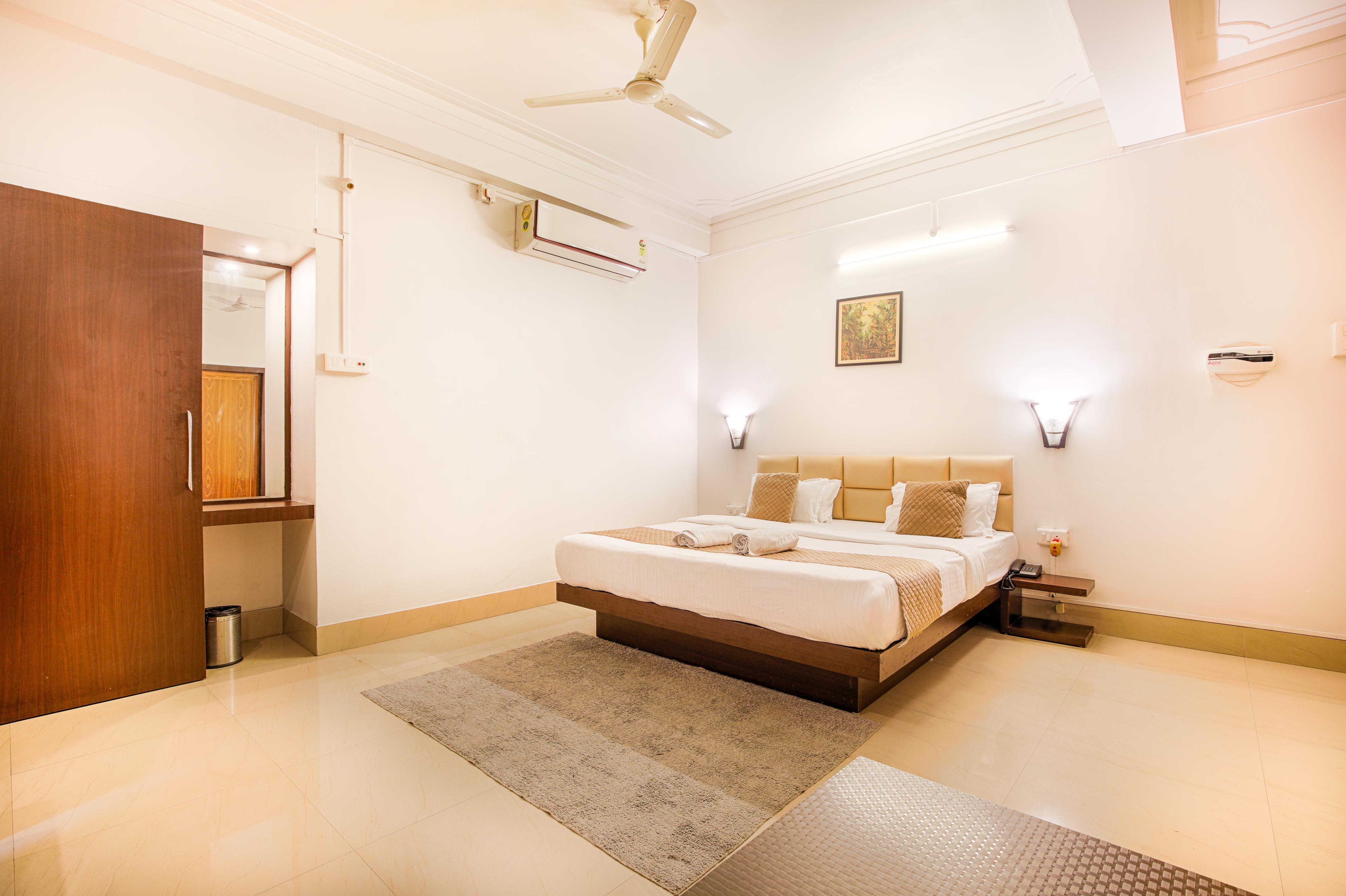 BMG Urban Stay | Rooms & Wi-Fi - Tap to explore photos