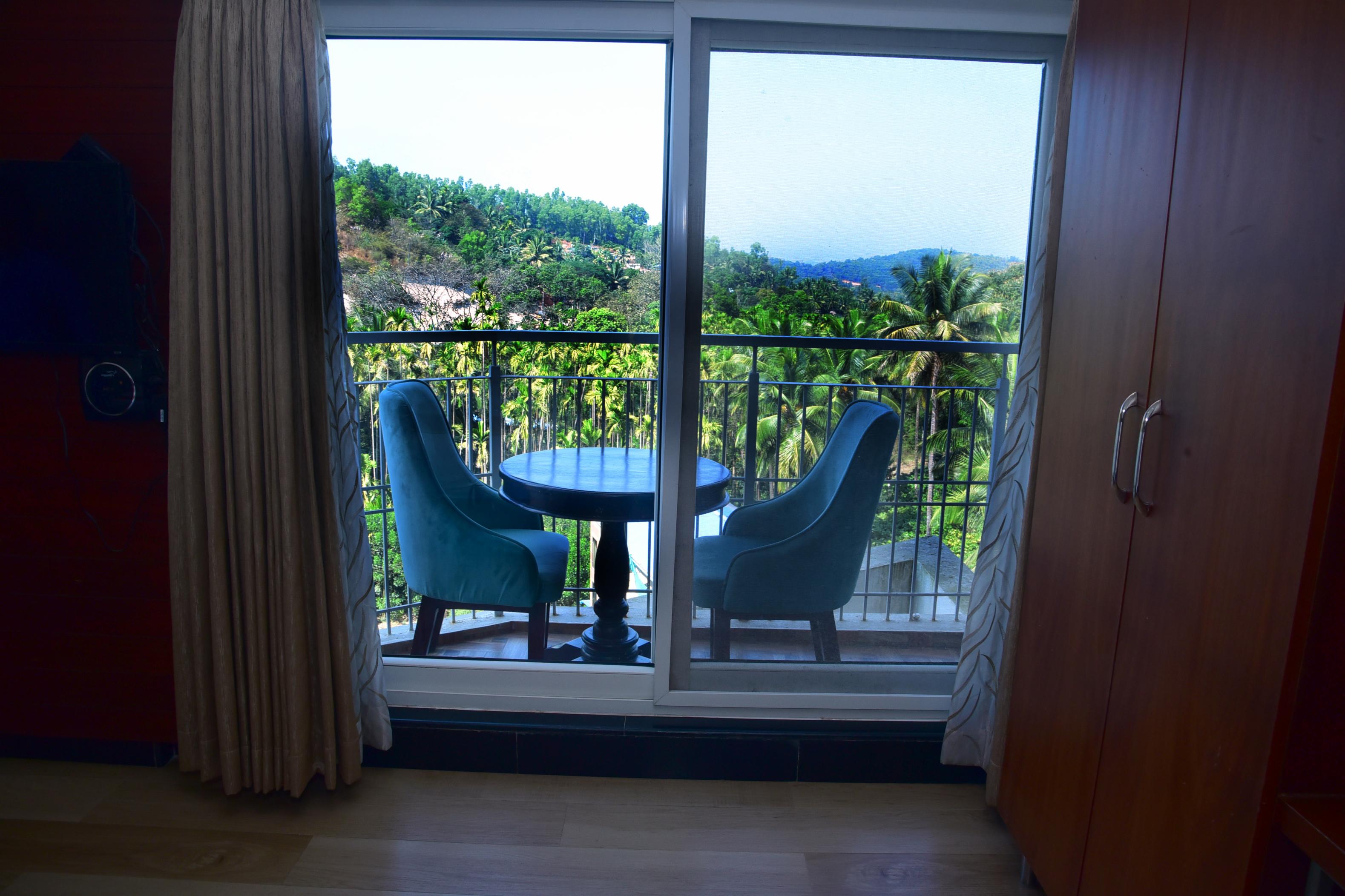 Hotel Sharada Comforts - Tap to explore photos