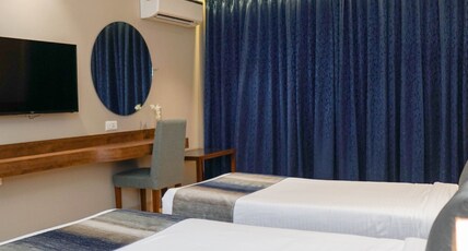 Cosmique Clarks Inn Suites Goa Room Type - Premium AC room with Twin Bed