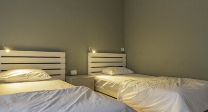 Woke HSR Room Type - Two Bed Male Dormitory Room with Common Bathroom