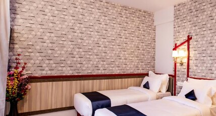 Hotel Prabha Palace Room Type - Deluxe Room with Twin Bed Room