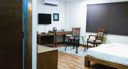Athasri Inn Infantry Road Room Type - Premium Kitchenette Room