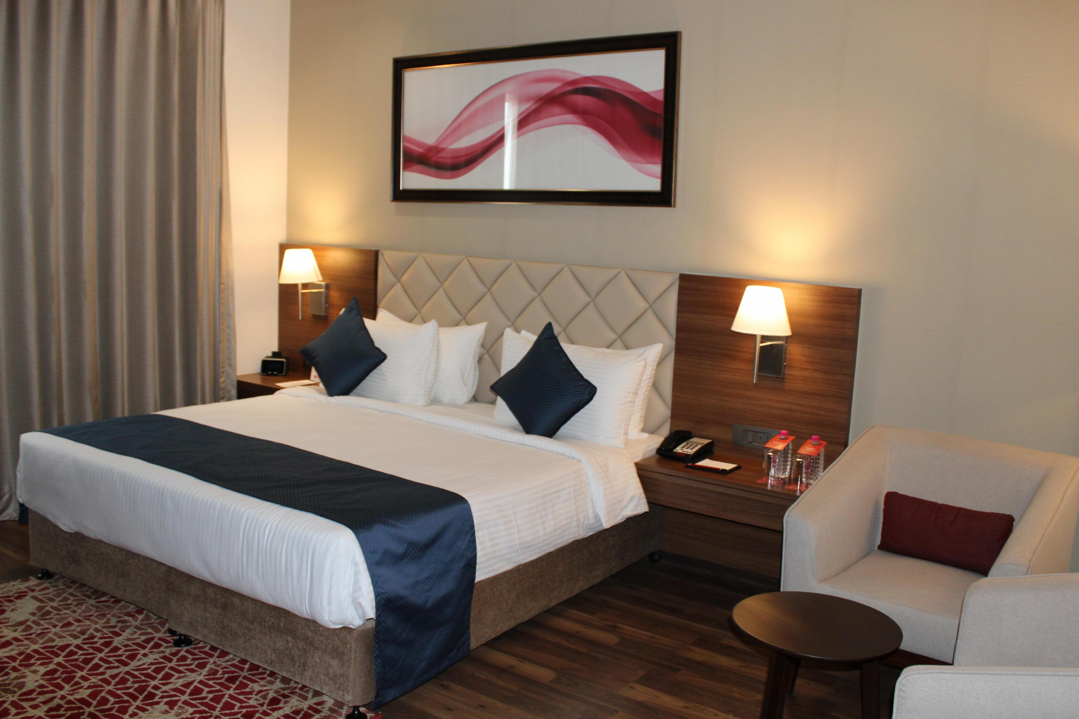 Ramada by Wyndham Gandhidham Shinay - Tap to explore photos