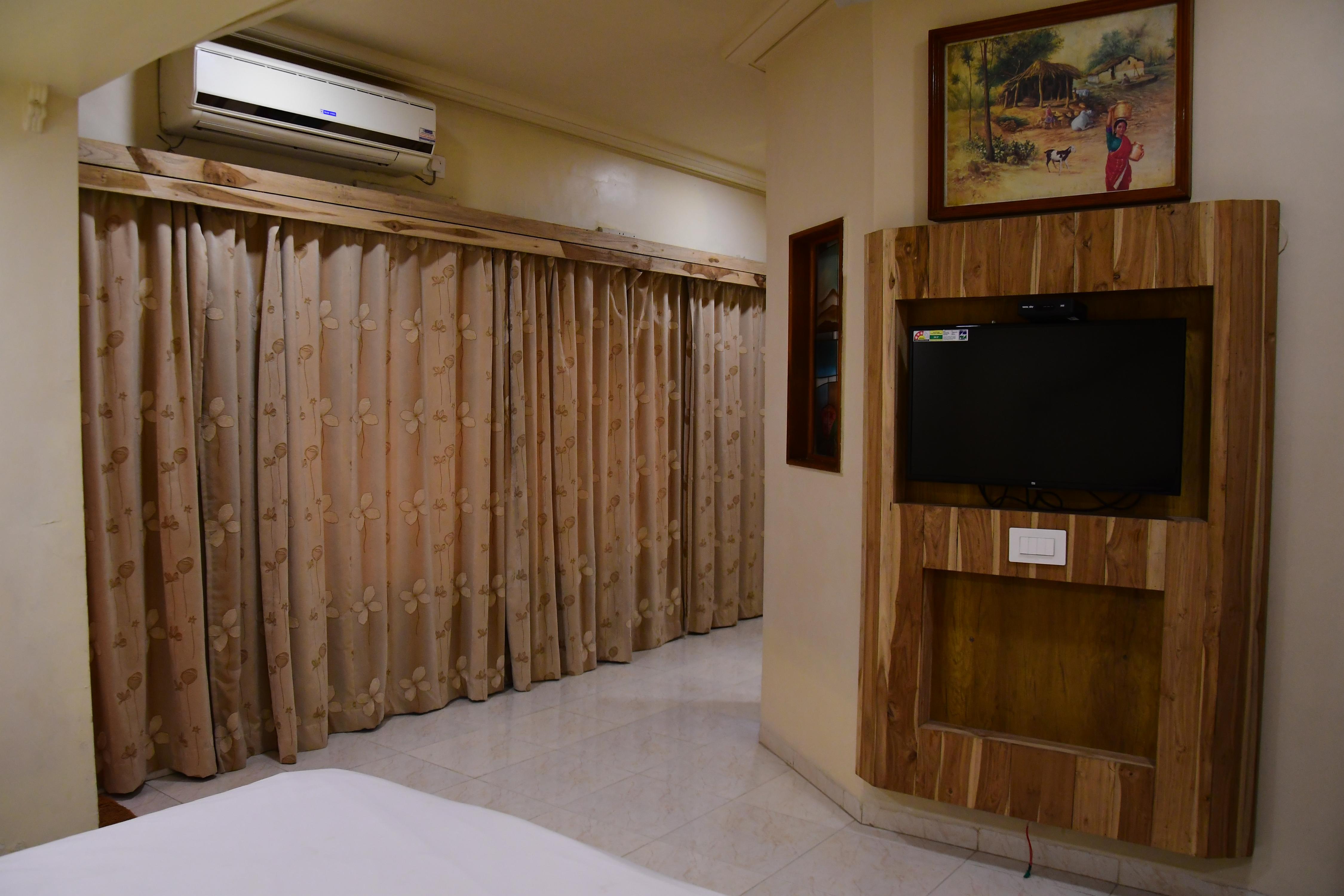 Hotel Shripad - Tap to explore photos