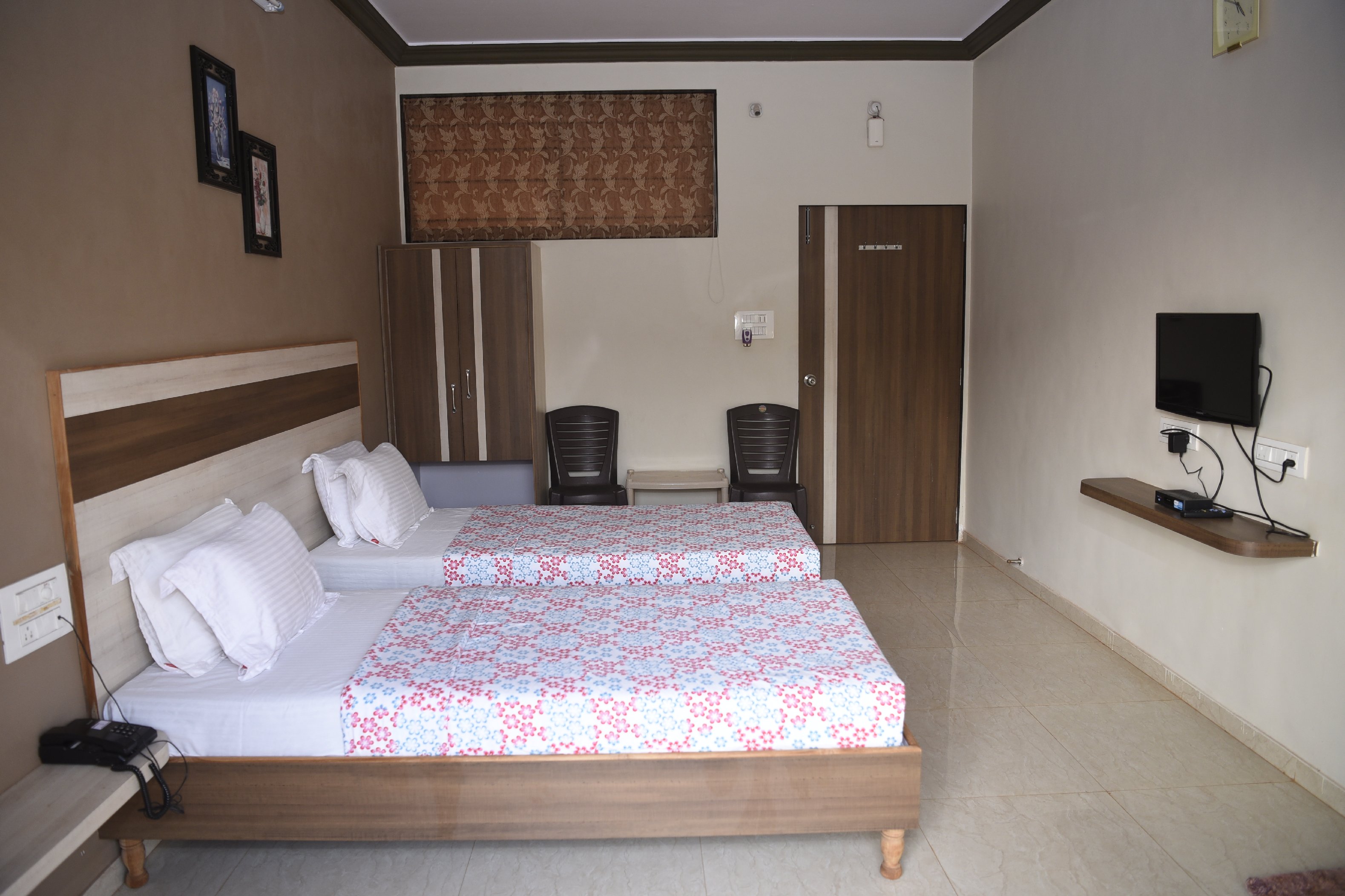 Hotel Abhishek - Tap to explore photos