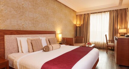 The Galgotias Hotel Gurugram Room Type - Deluxe Room