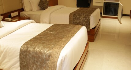 Robusta Inn Room Type - Deluxe room without balcony twin bed
