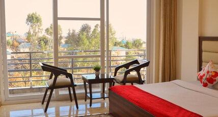 Serene Suites Room Type - Super Deluxe with River Side View and Mountain side View with Balcony Serene Suites Room Type - Super Deluxe with River Side View and Mountain side View with Balcony