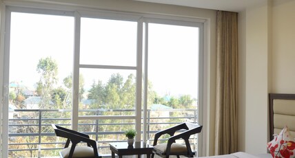 Serene Suites Room Type - Family Room with Balcony Mountain view Serene Suites Room Type - Family Room with Balcony Mountain view