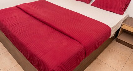 Hotel Sapthagiri Nest Room Type - Deluxe Double AC