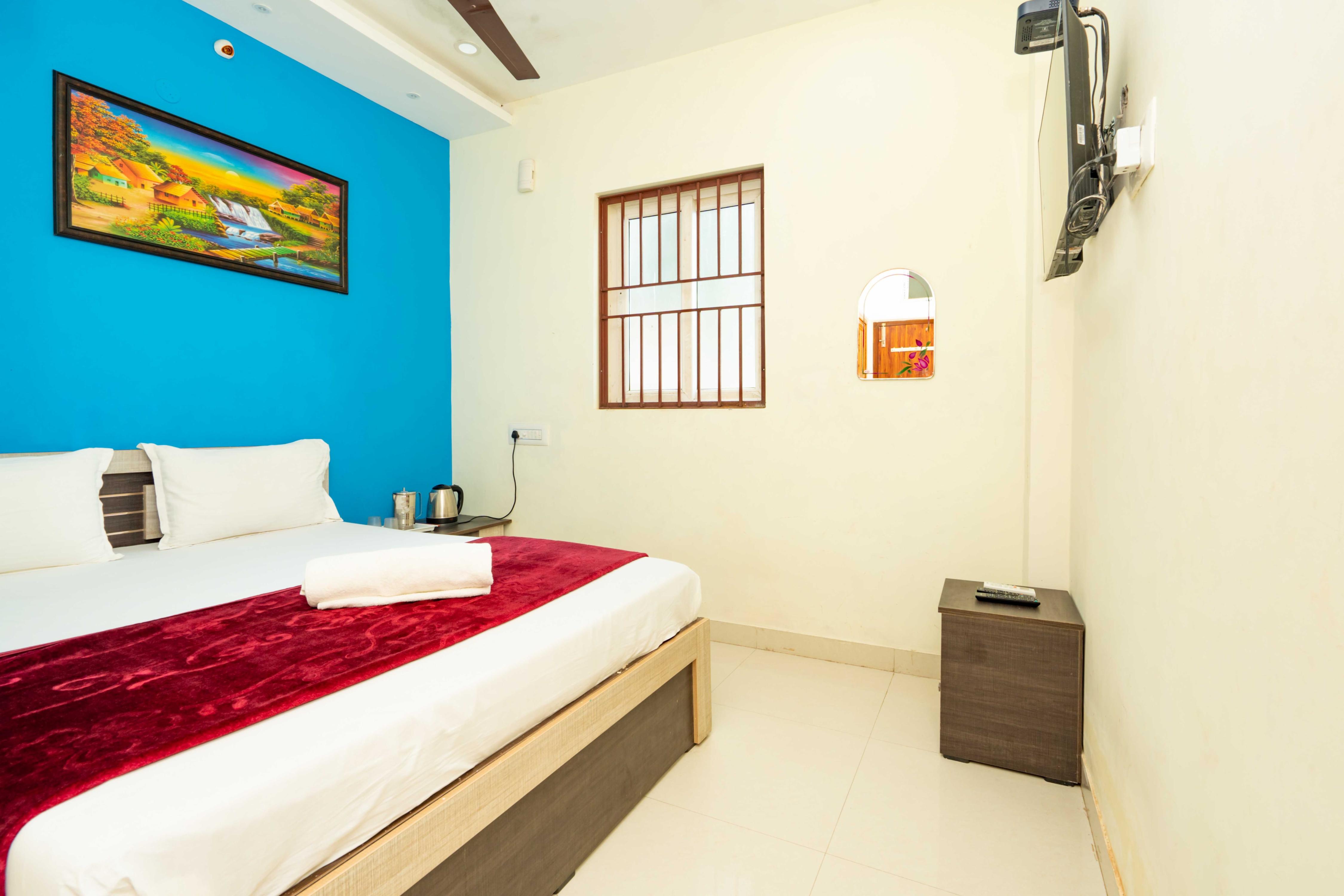 Hotel Jothirling - Tap to explore photos