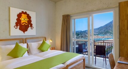 Bedzzz Rishikesh by Leisure Hotels (Laxman Jhula) Room Type - Deluxe Room Ganges Facing