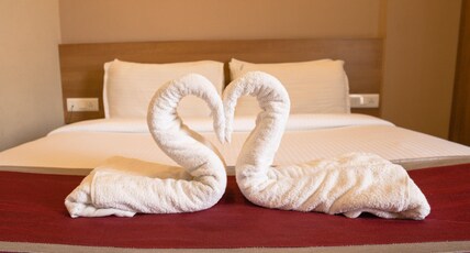 SAMASTH ROOMS & SUITES Room Type - AC Queen Double Room