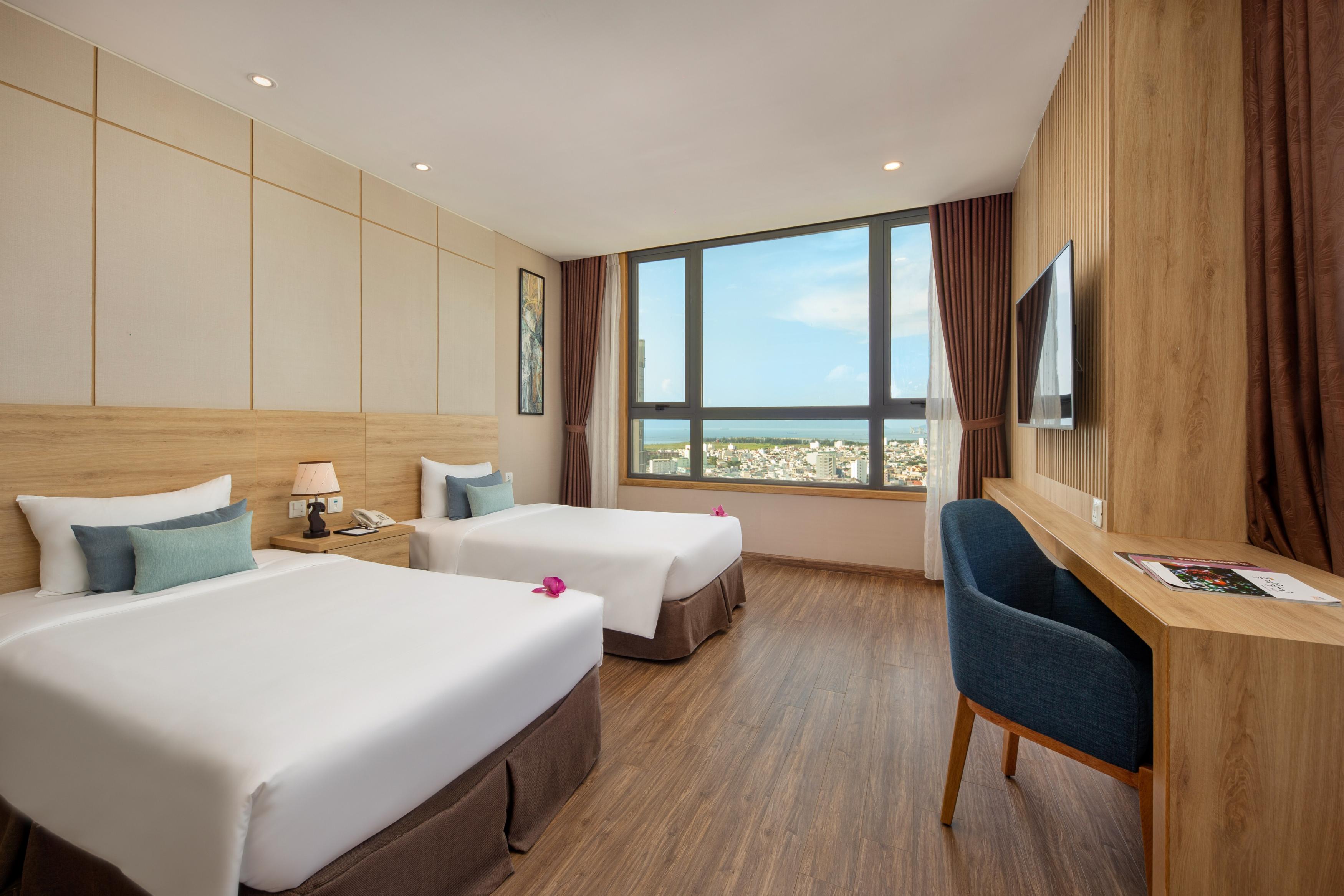 G8 Luxury Hotel Da Nang - Tap to explore photos