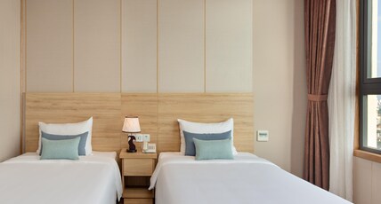 G8 Luxury Hotel Da Nang Room Type - Grand Deluxe Twin Room with City View G8 Luxury Hotel Da Nang Room Type - Grand Deluxe Twin Room with City View
