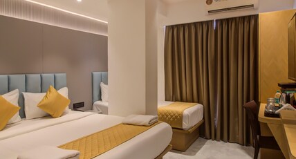 Hotel Malad Inn Room Type - Deluxe Triple Room