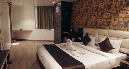 The Crims Hotel Pratap Nagar Room Type - Super Deluxe room