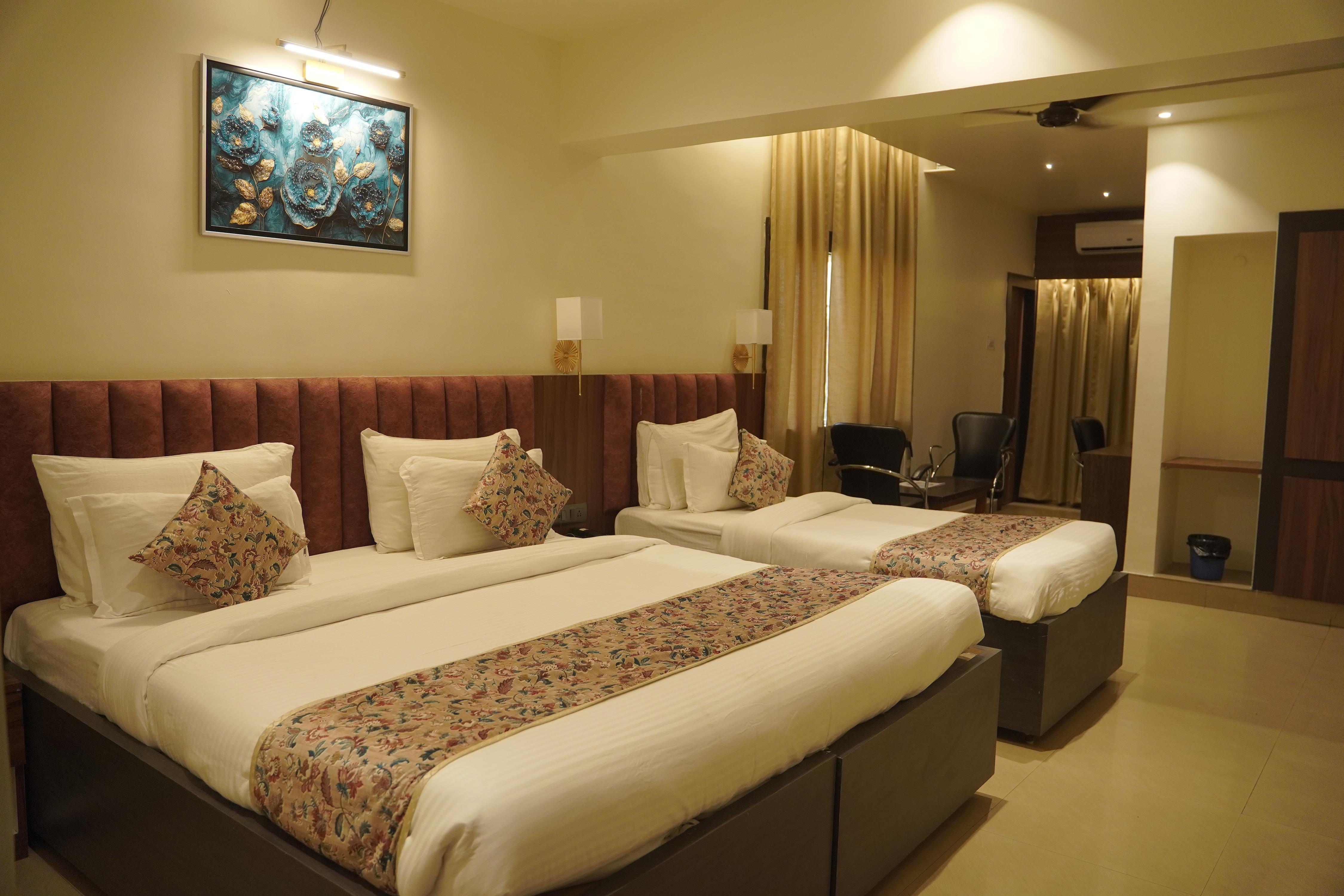 HOTEL RELIANCE Room Type - Deluxe family Room