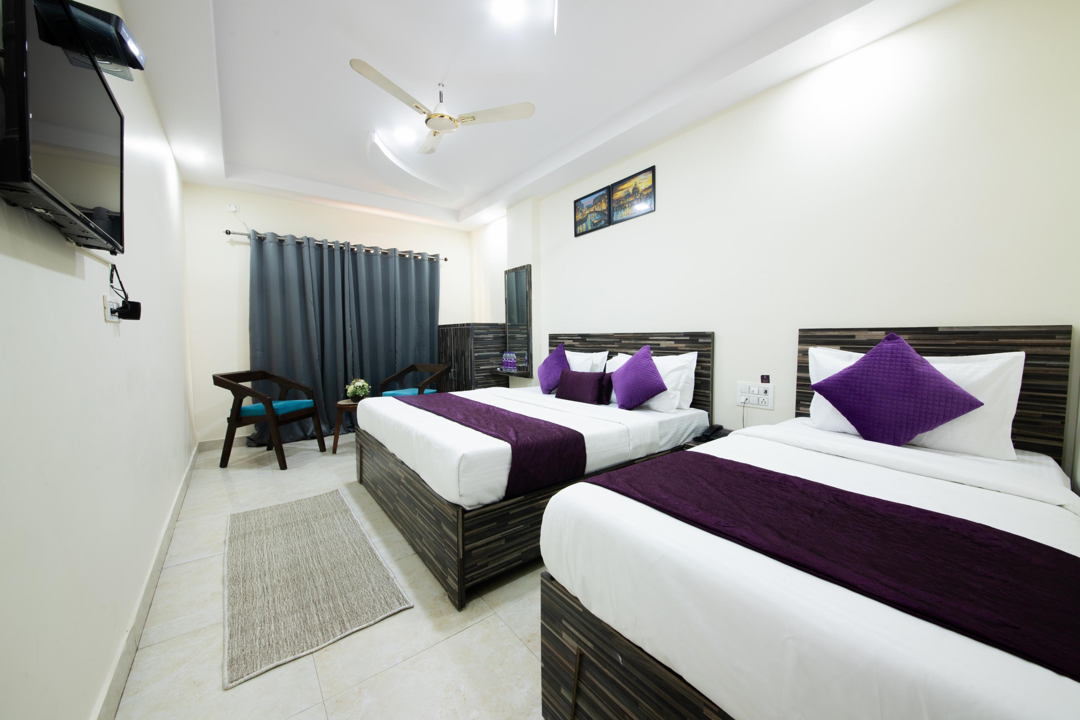 Perfectstayz Value Umra Grace near Haridwar Railway Station Room Type - Tripple Bed ( Corona Disinfected rooms)